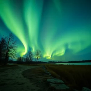 Aurora over dark landscape