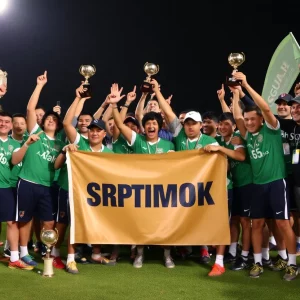 Victorious team celebrating with trophies and banners.